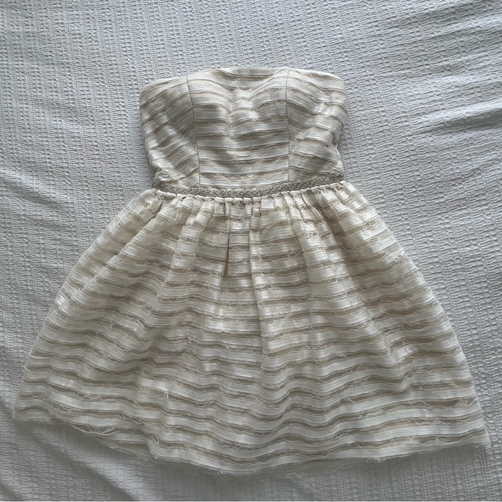 Minuet cream and gold dress for young girls. Very cute.